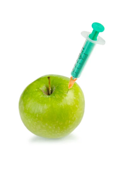 Experiment with apple and syringes — Stock Photo, Image