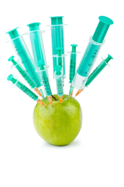 Experimentera med äpple och sprutor — Stockfoto