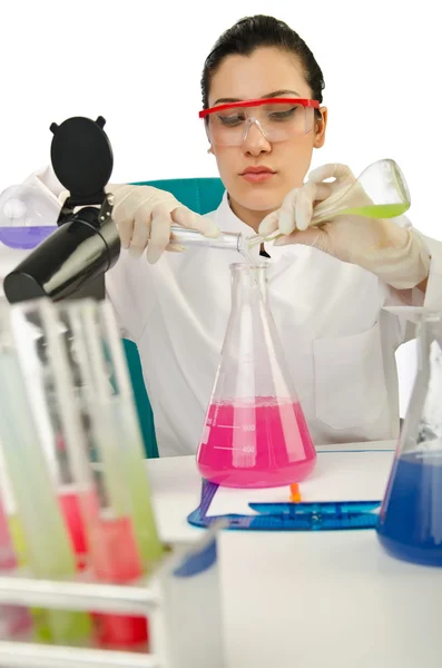 Female chemist in studio on white — Stock Photo, Image