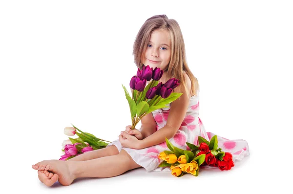 Linda niña con flores en blanco —  Fotos de Stock