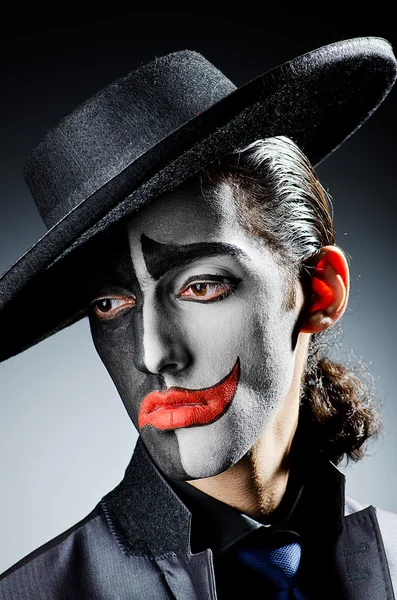 Affärsman med clown ansikte måla — Stockfoto