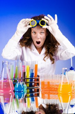Funny female chemist in lab