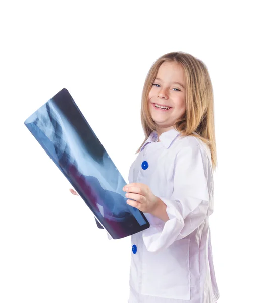 Little gilr playing doctor with x-ray — Stock Photo, Image