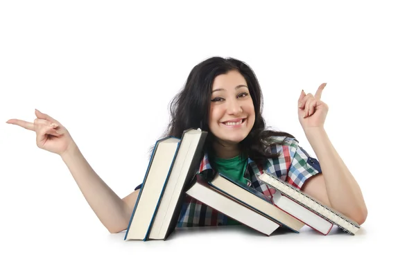 Estudante cansado com livros didáticos sobre branco — Fotografia de Stock