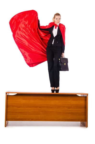 Superwoman de pé sobre a mesa — Fotografia de Stock