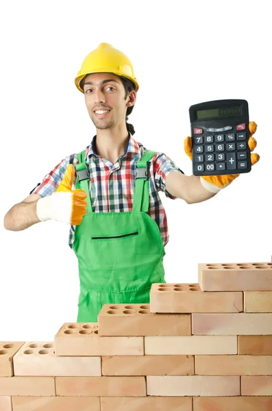 Concepto de construcción caro con constructor y calculadora — Foto de Stock