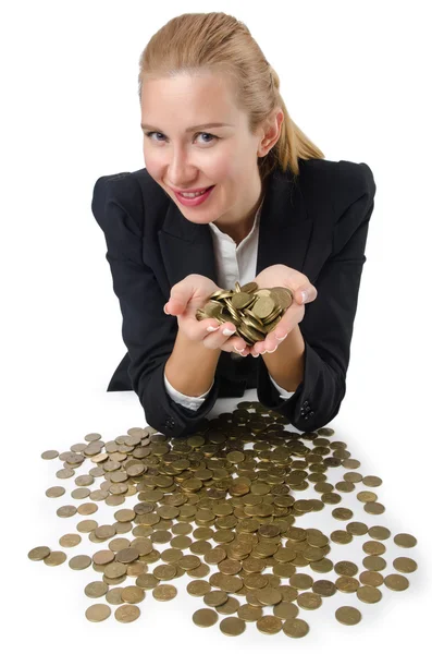 Woman with lots of coins on white — Stock Photo, Image