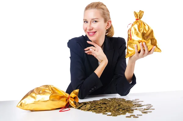 Mujer con monedas y sacos de oro — Foto de Stock