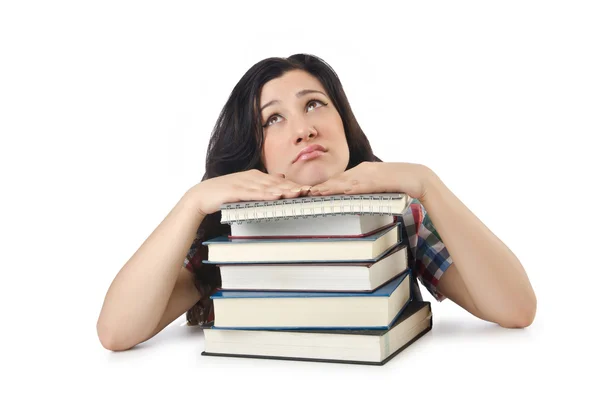 Beyazlar üzerine ders kitapları olan yorgun öğrenci — Stok fotoğraf