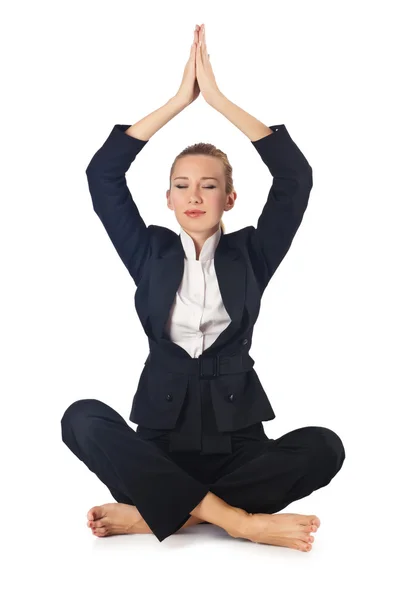 Young businesswoman meditating on the white — Stock Photo, Image