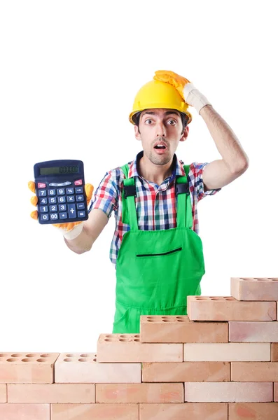 Concepto de construcción caro con constructor y calculadora — Foto de Stock