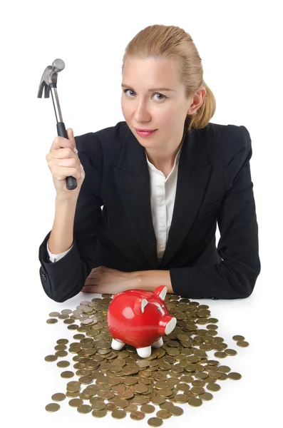 Woman breaking piggy bank for savings — Stock Photo, Image