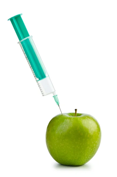 Experiment with apple and syringes — Stock Photo, Image