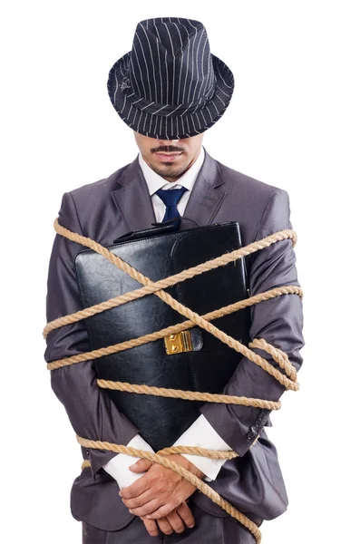 Businessman tied up with rope — Stock Photo, Image