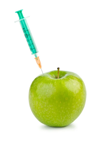 Experiment with apple and syringes — Stock Photo, Image