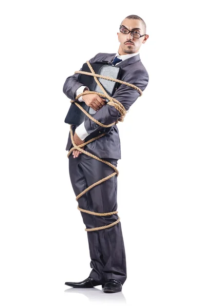 Businessman tied up with rope — Stock Photo, Image