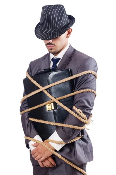 Businessman tied up with rope — Stock Photo, Image