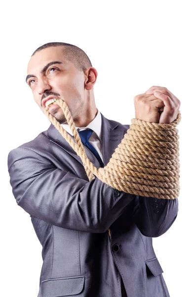 Businessman tied up with rope — Stock Photo, Image