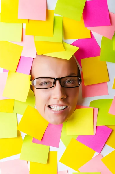 Mujer con muchas notas recordatorias —  Fotos de Stock