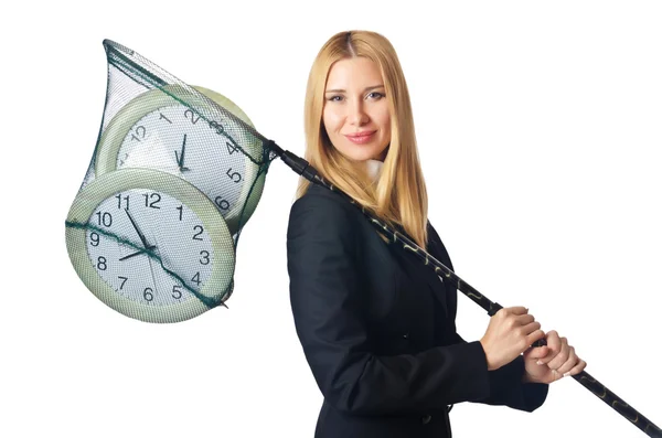 Femme d'affaires avec filet et horloges — Photo