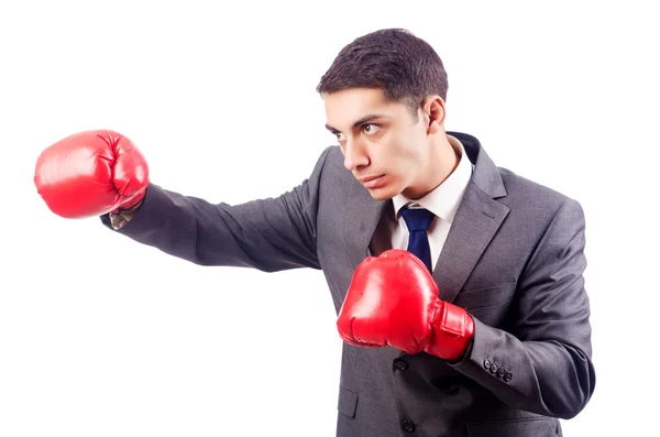 Empresario con guantes de boxeo en blanco — Stockfoto