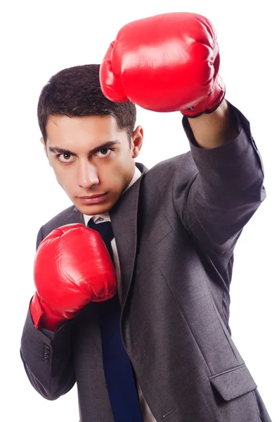 Homme d'affaires avec gants de boxe sur blanc — Photo