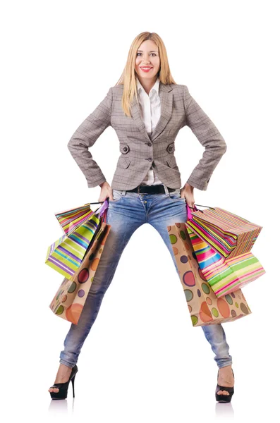 Attraktive Frau nach dem Weihnachtseinkauf auf weiß — Stockfoto