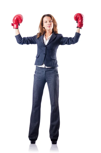 Femme d'affaires avec gants de boxe sur blanc — Photo