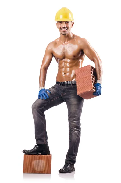 Sexy construction worker with bricks — Stock Photo, Image