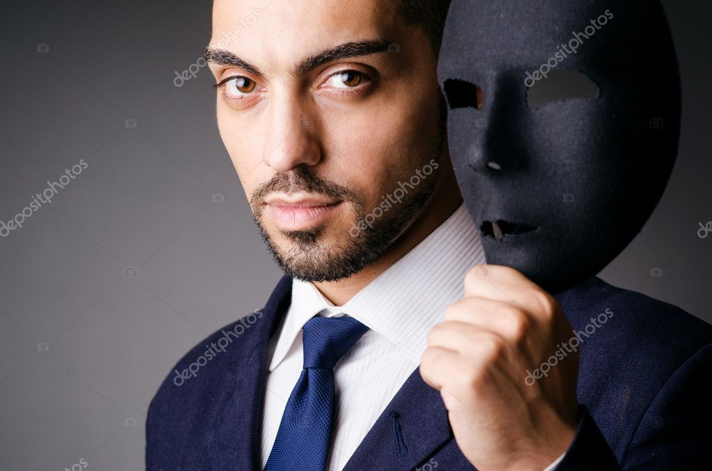 Man with black mask in studio — Stock Photo © Elnur_ 16984813