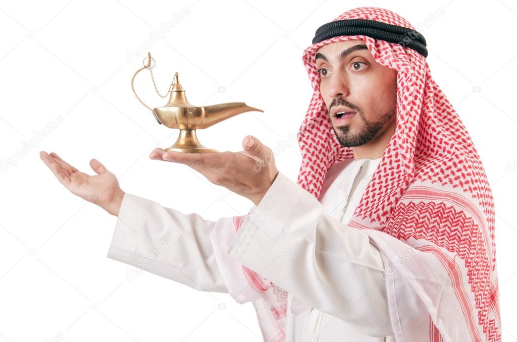 Arab man with lamp isolated on white