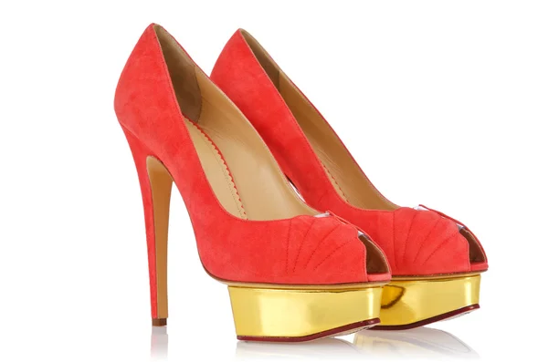 Червоні стильні жіночі туфлі ізольовані на білому — стокове фото