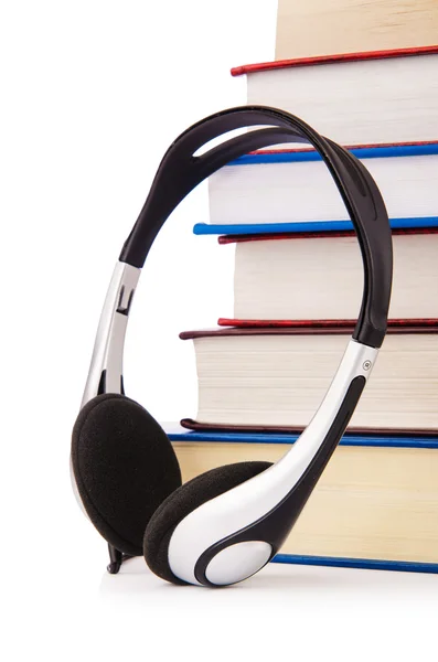 Concept of audio books with earphones on white — Stock Photo, Image