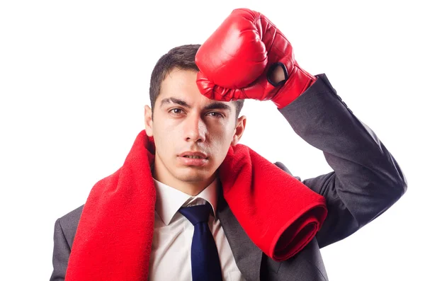 Uomo d'affari con guanti da boxe su bianco — Foto Stock