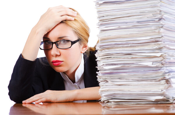 Woman businesswoman with lots of papers