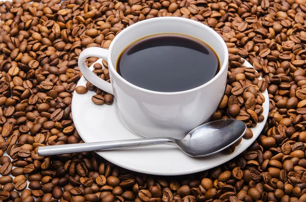 Cup of coffee and beans — Stock Photo, Image