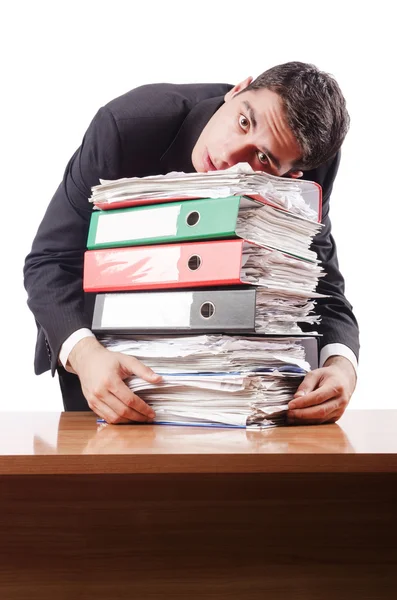 Jonge drukke zakenman achter zijn Bureau — Stockfoto