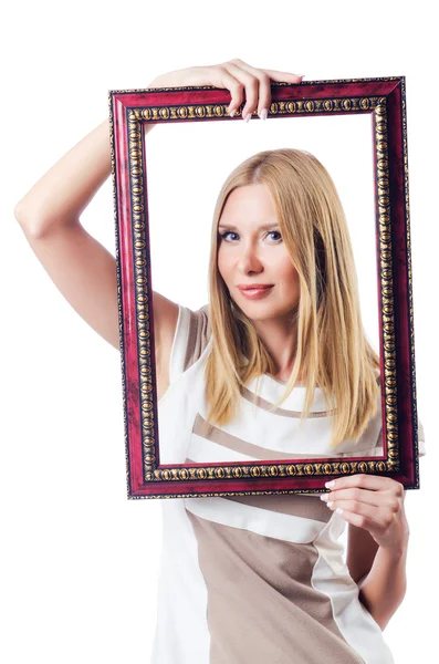 Woman with picture frame on white — Stock Photo, Image