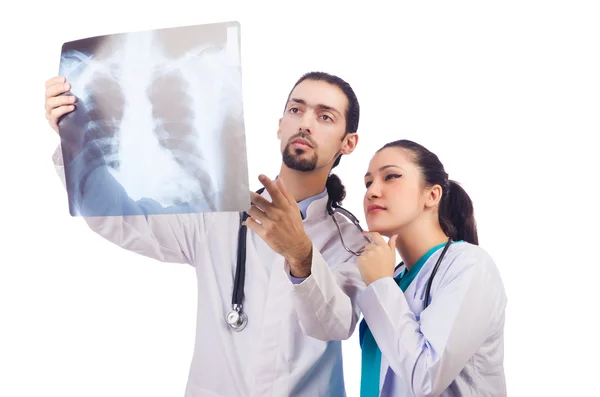 Two doctors looking at x-ray image on white — Stock Photo, Image