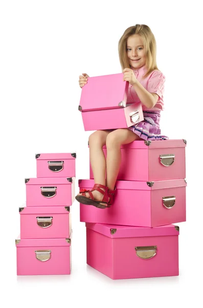 Little cute girl with lots of boxes — Stock Photo, Image