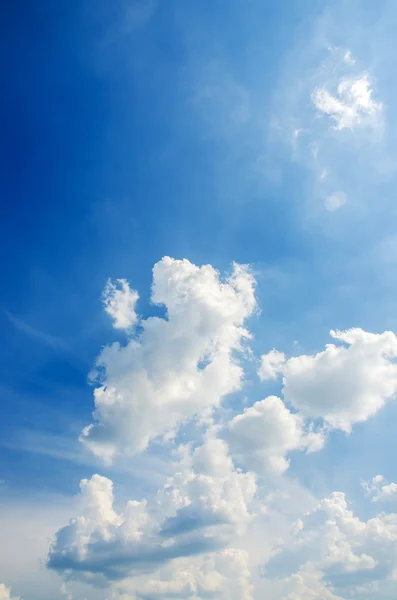 Cloudscape of bright blue sky