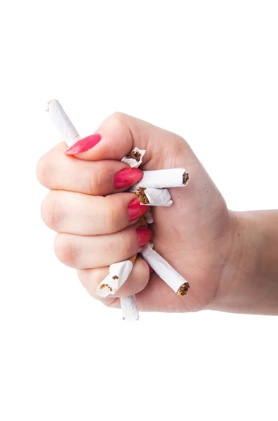 Antismoking koncept med cigaretter och hand — Stockfoto