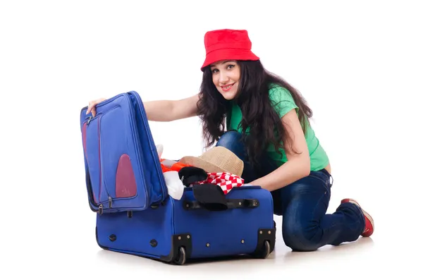 Young girl packing for vacation — Stock Photo, Image