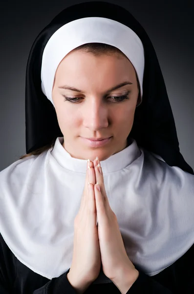 Young nun in religious concept — Stock Photo, Image