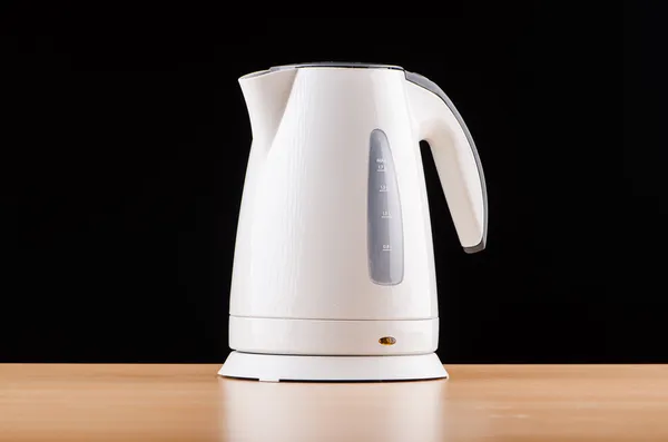 White kettle against grey background — Stock Photo, Image