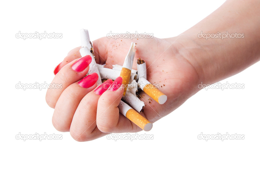 Antismoking concept with cigarettes and hand