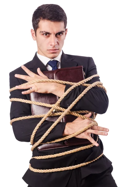 Empresário amarrado com corda no branco — Fotografia de Stock