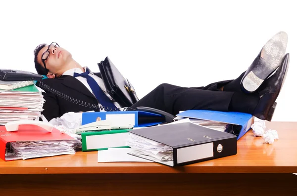 Jovem empresário ocupado em sua mesa — Fotografia de Stock