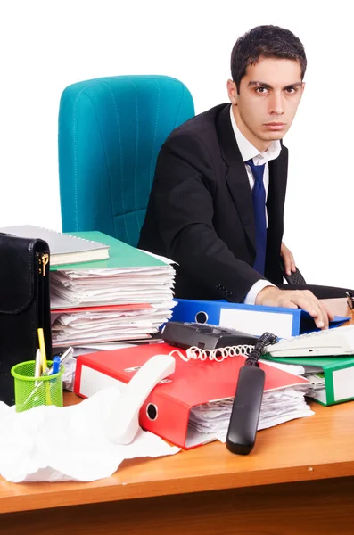 Jovem empresário ocupado em sua mesa — Fotografia de Stock