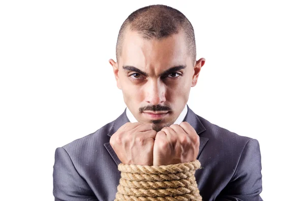 Businessman tied up with rope — Stock Photo, Image